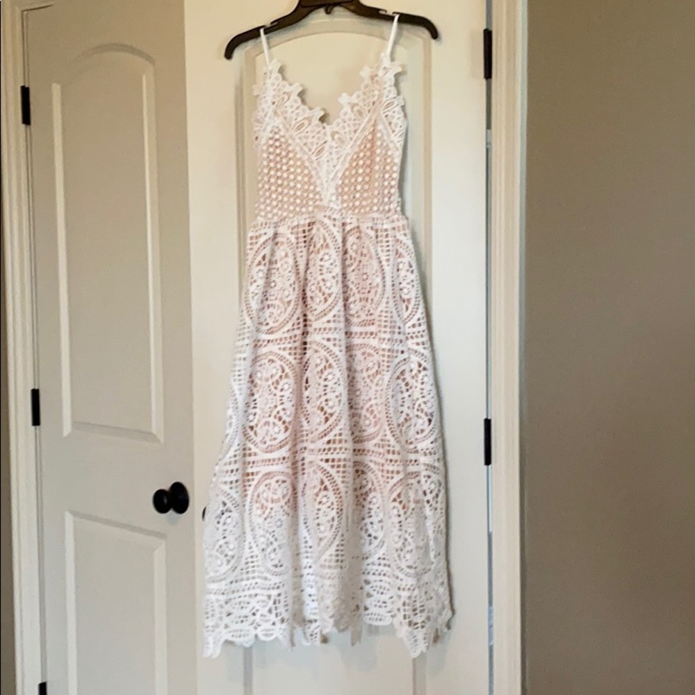 NWOT White dress w beautiful nude underlay.